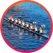 Crew of rowers on water