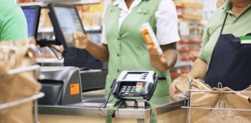 checking out and bagging groceries at the store