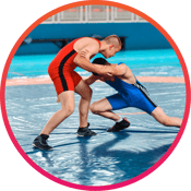 Two wrestlers on a mat