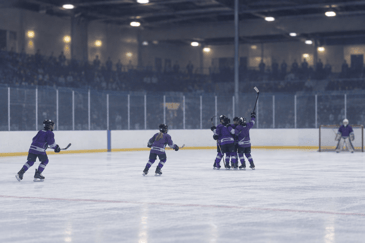 Youth hockey players on rink