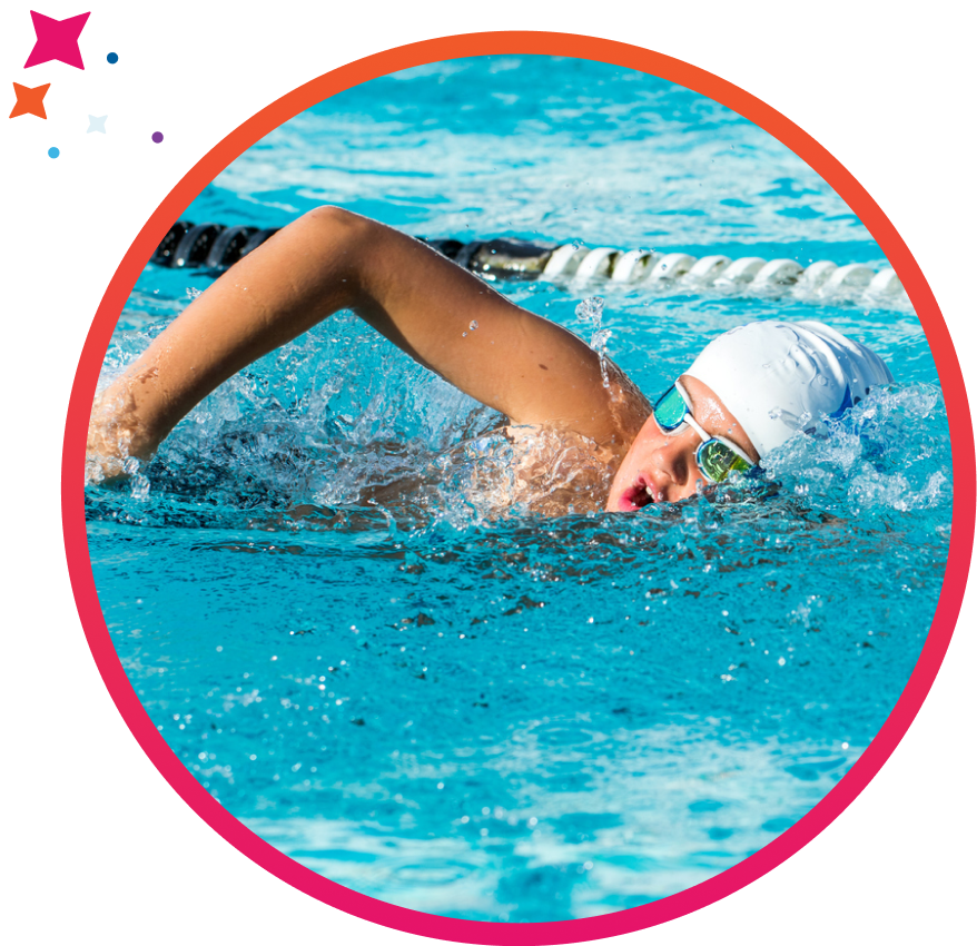 Swim team member practicing freestyle