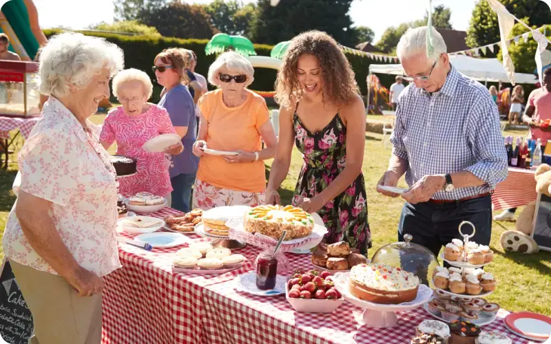 Group of non-profit volunteers managing a bake sale